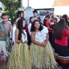 Tachi dancers prepare to perform at the unveiling of the new mural.